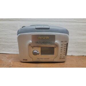 Aiwa TP381 portable cassette player with AM/FM radio and auto-reverse.